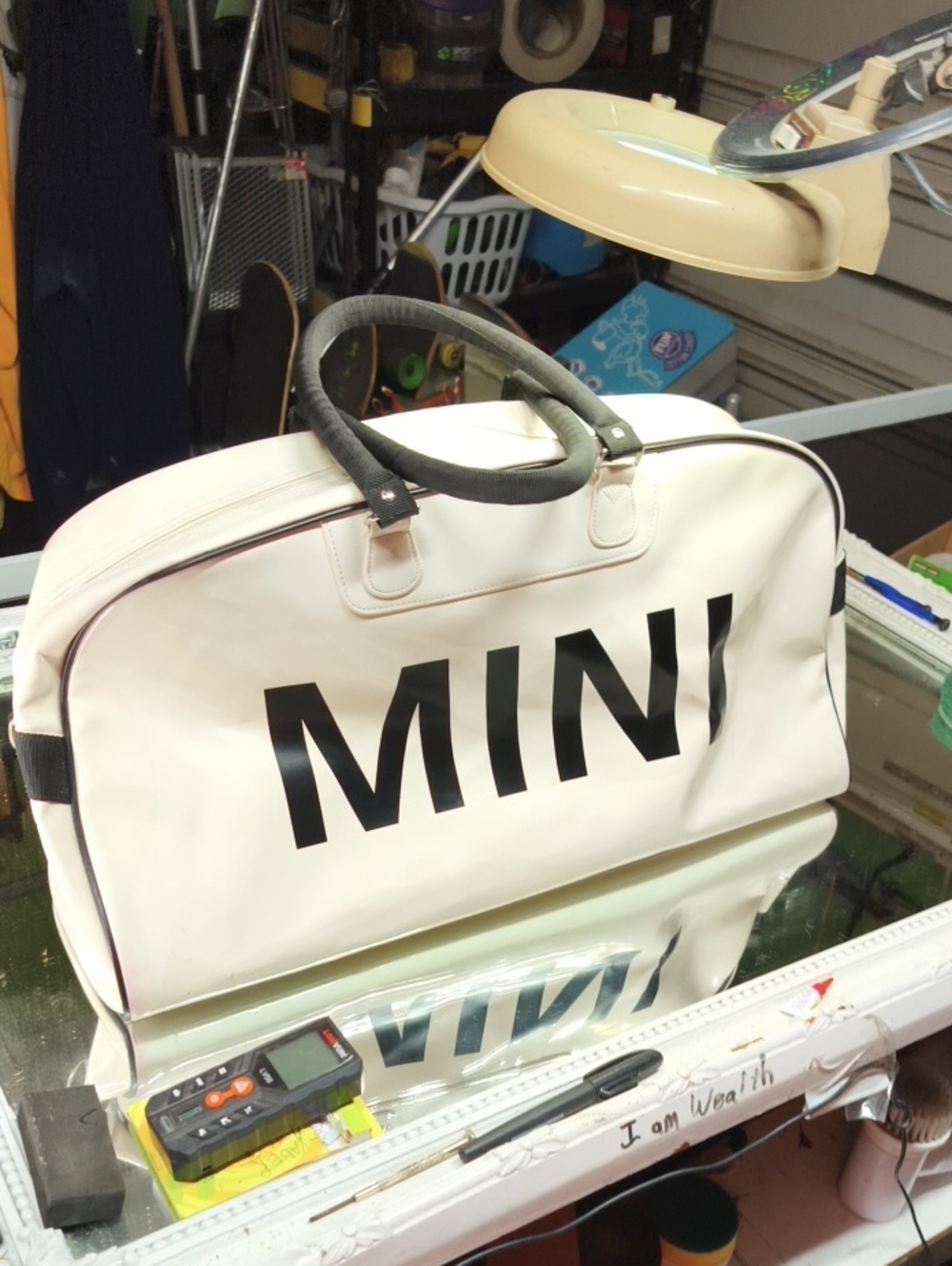 White MINI Cooper duffle bag W/ distinctive patent finish  bold black Letters